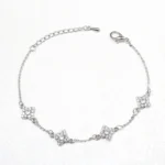 Bracelet quatre trèfles quatre feuilles strass blanc maille fine ovale argent ABA