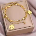 Gold double bracelets two four-leaf clovers oval and rectangular mesh ELA